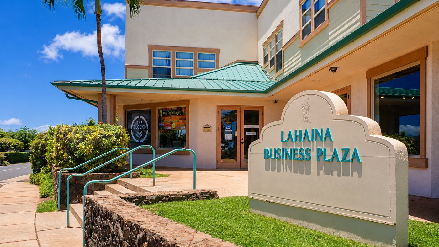 The Lahaina Business Plaza entrance, with its green roof and stone sign, where Maui Digital Imaging has its studio.